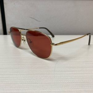 Gold Frame Women’s Sunglasses with Red Lenses